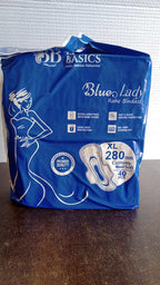 Side view of the sanitary pad, illustrating its thickness and absorbent layers.