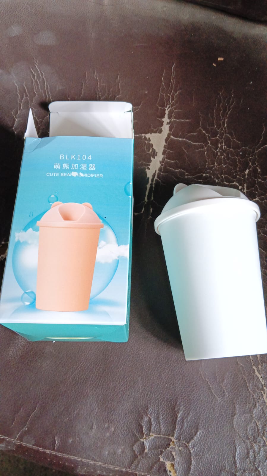 Compact USB humidifier in a cute bear design, featuring an LED light.