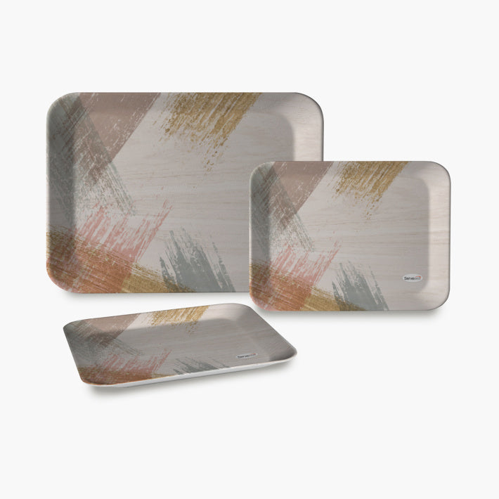 Three multicolor serving trays available in small, medium, and large sizes for dining.