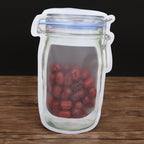 Organized pantry with the transparent mason jar zipper bags storing various food items.
