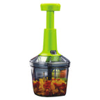 White manual vegetable chopper with 1100ml capacity on a clean kitchen counter.