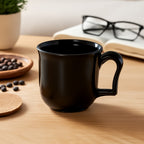 Premium black plastic coffee mug with a comfortable handle, ready for daily use.