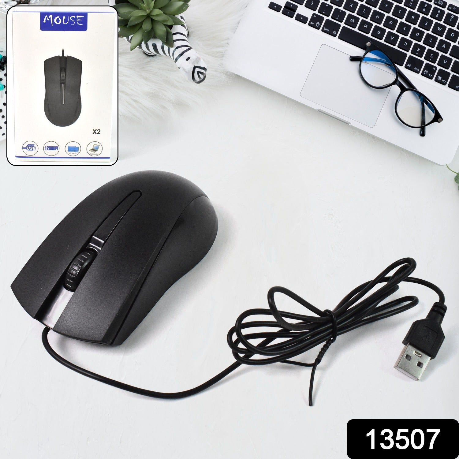 Close-up of the ergonomic Compshop X2 Wired Optical Mouse, highlighting its comfortable grip.