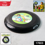 Compact small outdoor frisbee disc thrown in open park space