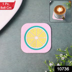 Ceramic cup placed on vibrant lemon-patterned silicone drink coaster