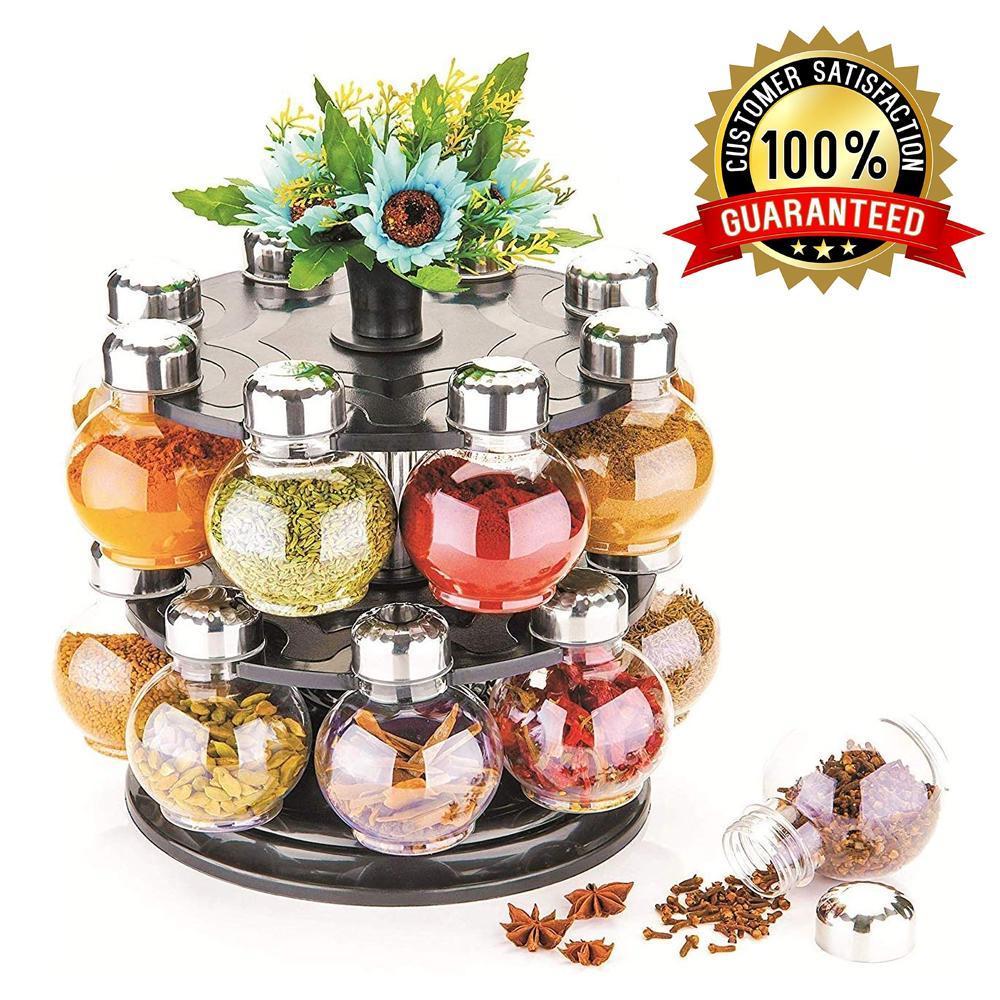 Top-down view of the rotating spice organizer, full of various Indian masalas.