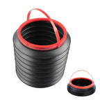 Multipurpose foldable car bin with items like water bottles and tissues inside.