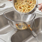 Strainer basket placed in kitchen sink for washing produce