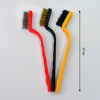 Close-up of the stainless steel mini wire brush, ideal for removing welding slag and paint.