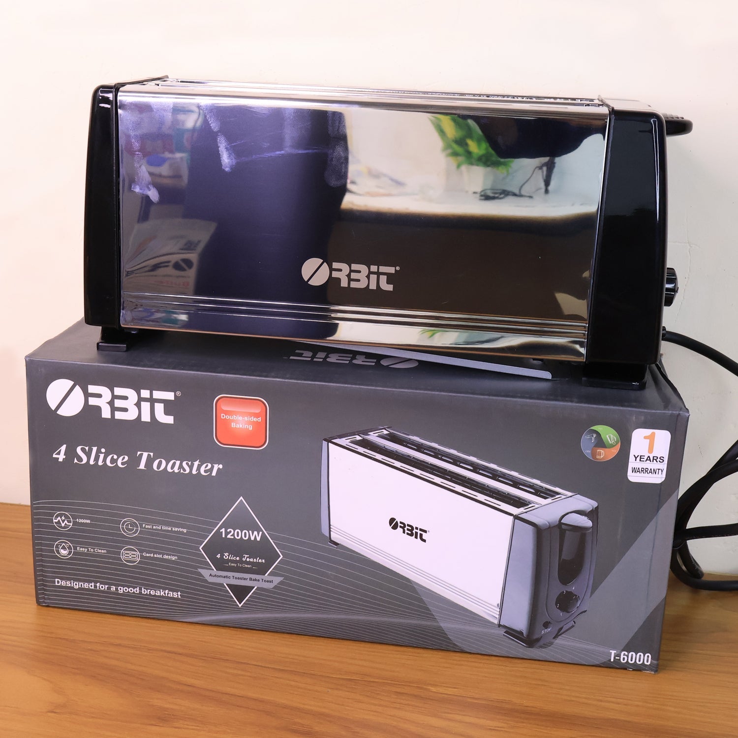 Packaging box for Orbit 1200W pop-up toaster with product branding