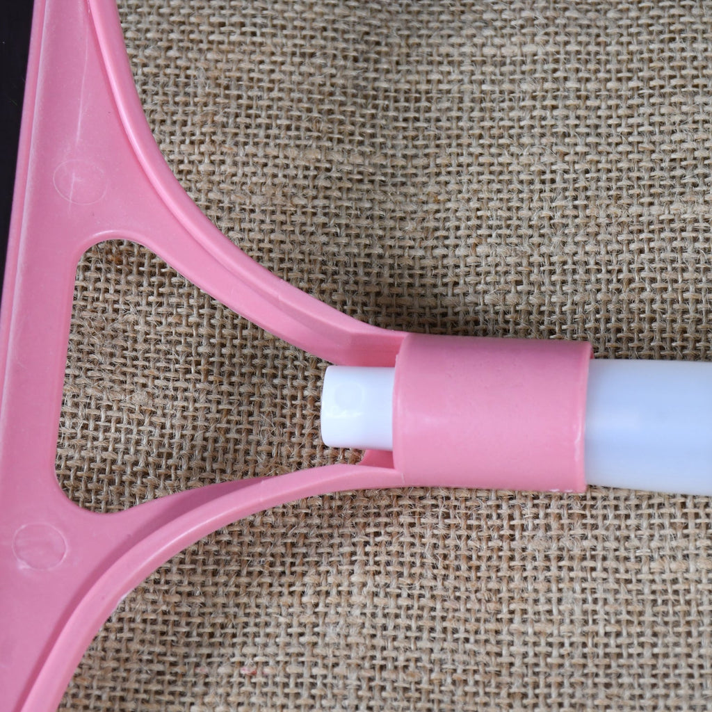 All components of the Window Cleaning Spray Brush: handle, bottle, and squeegee.