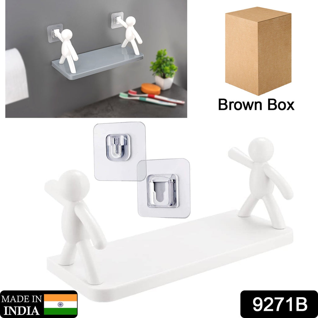 Wall-mounted organiser shelf with human figurine, ideal for displaying small items.