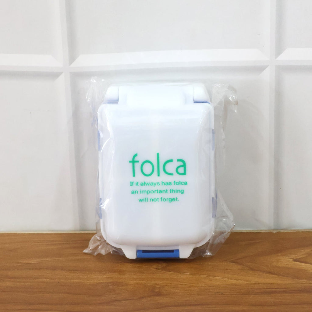 Blue portable pill organizer with secure lids