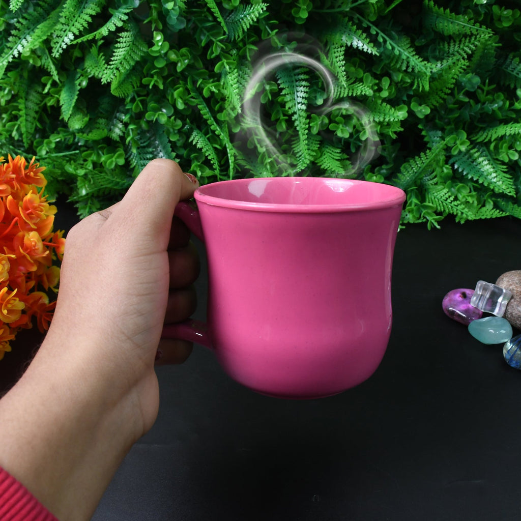 A single plastic coffee mug displayed against a plain background, highlighting its simple elegance.