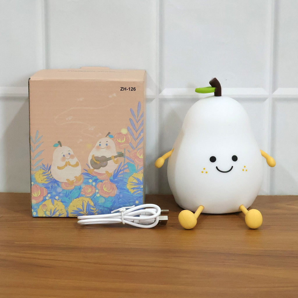 Close-up of the cute smiling face on the pear silicone lamp.