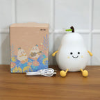 Close-up of the cute smiling face on the pear silicone lamp.