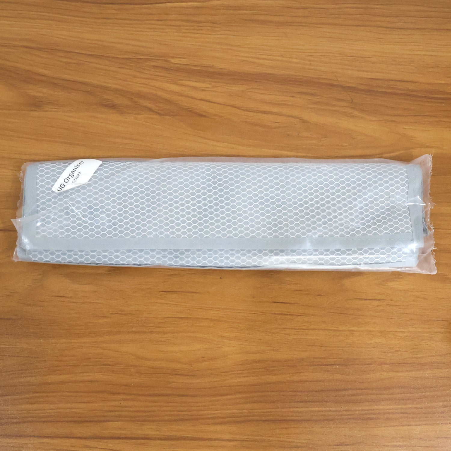 Lifestyle photo of tidy closet using foldable under garment storage bag