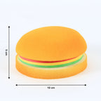 A set of burger notes shown from different angles, emphasizing their unique and playful design.