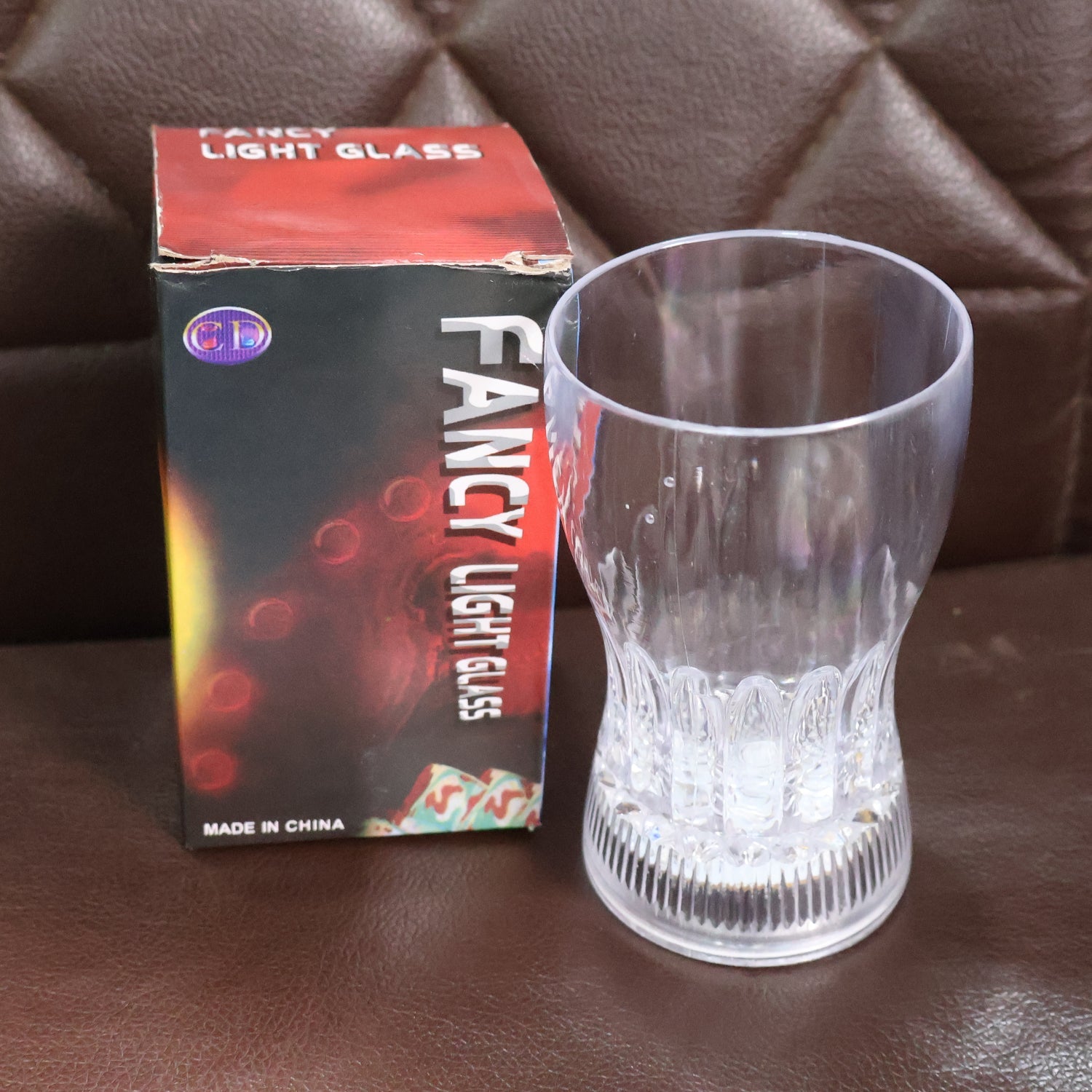 Packaging box of the  LED Light Glass highlighting product features.