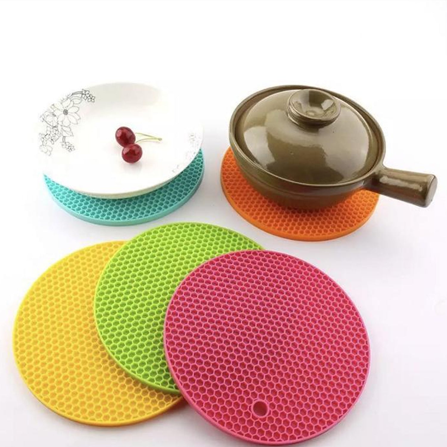 Compact silicone trivet providing kitchen and table protection.
