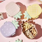 Closed pineapple shaped kids bento lunch box ready for school.