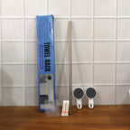 Close-up of towel rack showing rust-resistant metal rod and brackets