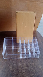 Clear acrylic makeup organizer displayed in bright room setting