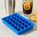 Multicolor silicone ice cube tray with 24 flexible cavities.