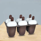 The complete 6-cup Kulfi Maker set in plastic, ready for homemade treats.