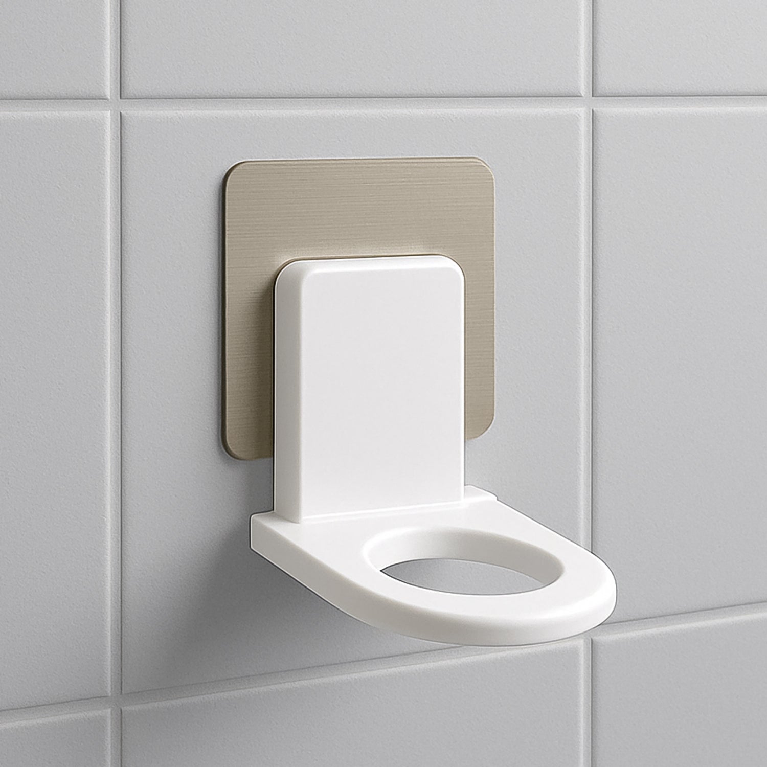 Close-up of a white wall-mounted shampoo holder with a bottle.