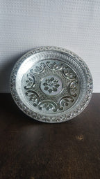 Side view of traditional silver finish lightweight plastic pooja thali