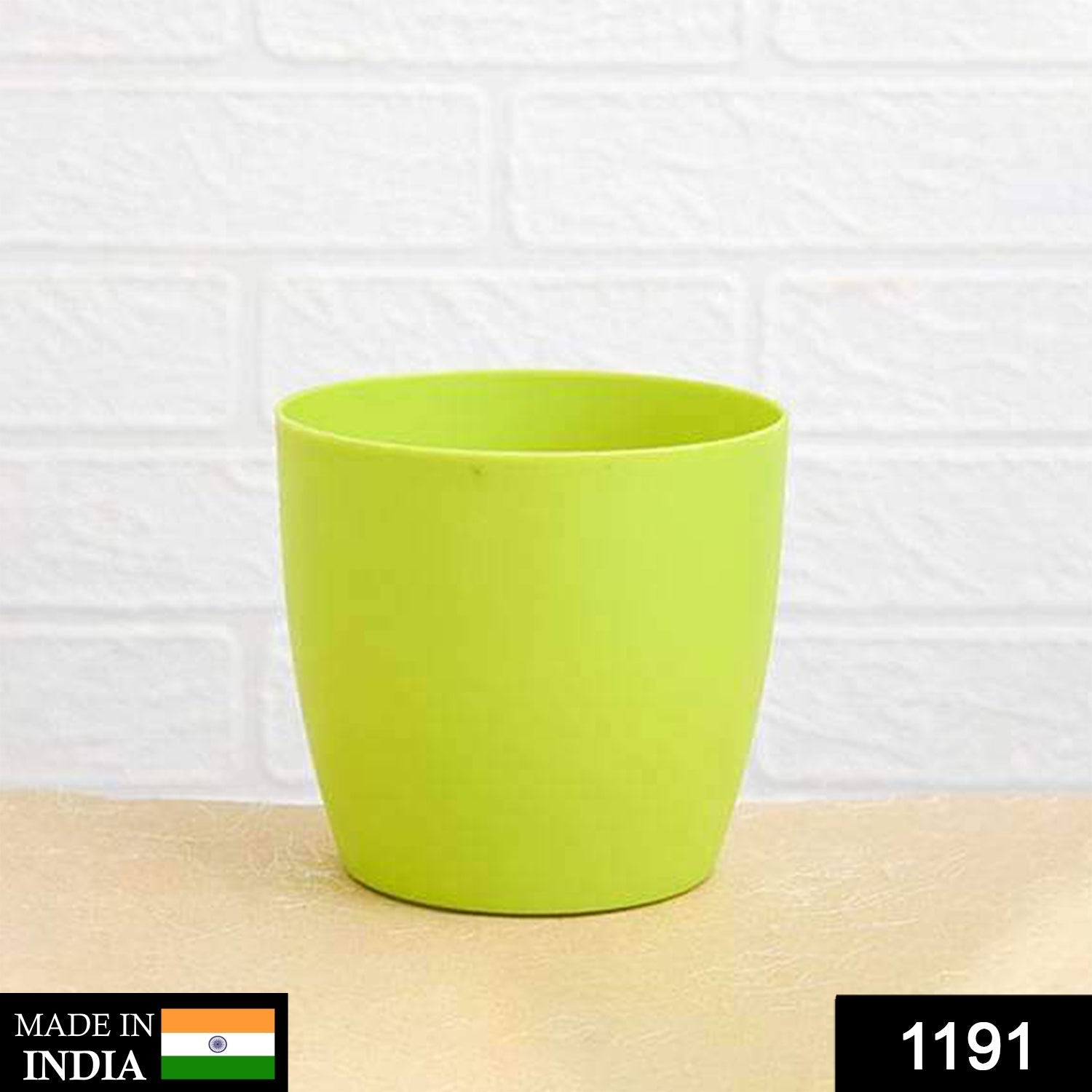 Close-up of a versatile round plastic flower pot, perfect for various gardening needs.