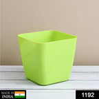 Set of colourful square flower pots designed for balcony gardens.