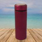 Close up of stainless steel insulated travel flask with secure lid