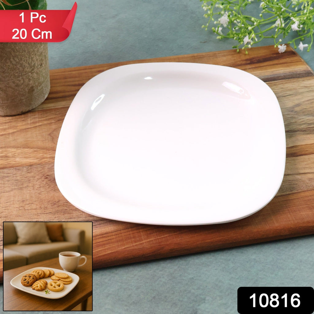 Stack of white plastic square dinner plates with smooth finish