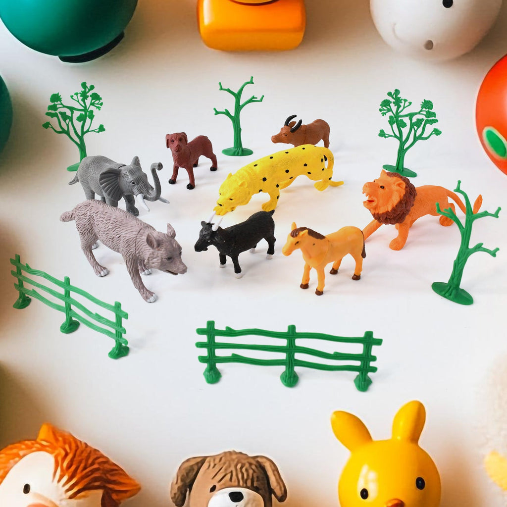 14-piece Animal Kingdom toy set featuring realistic wild animals, trees, and fences
