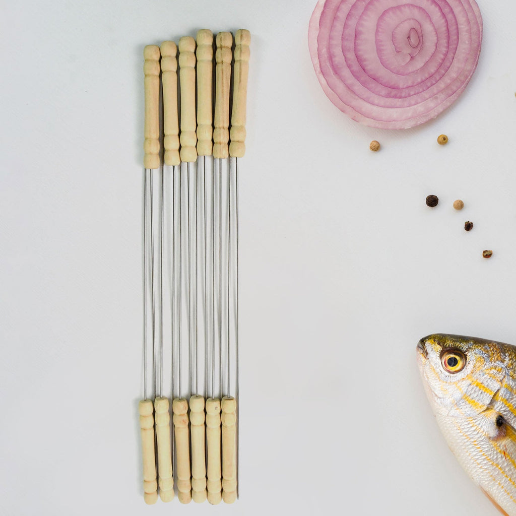Assorted vegetables and meat grilling perfectly on stainless steel BBQ skewers.