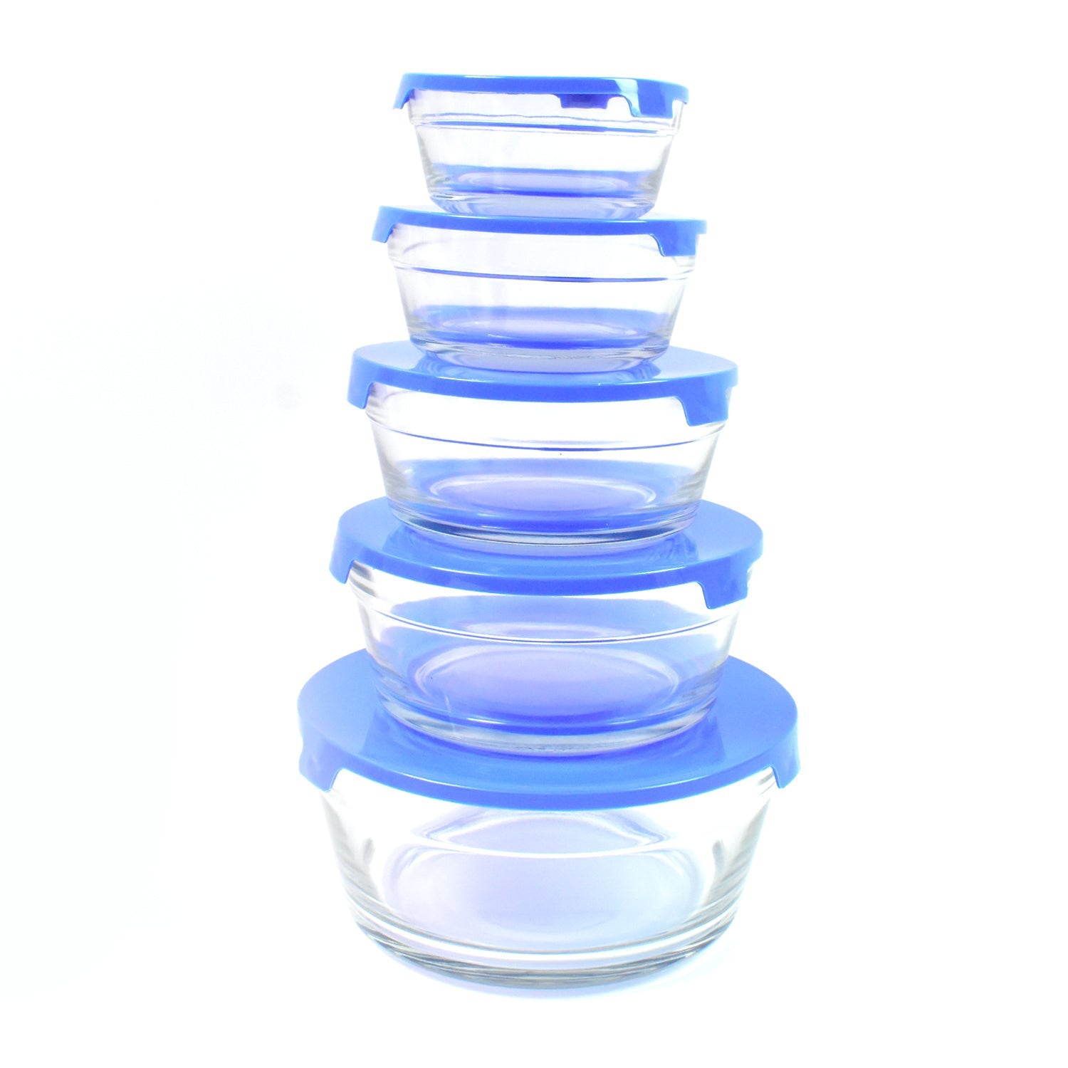 Organized kitchen cabinet showing stackable glass bowls for efficient storage.