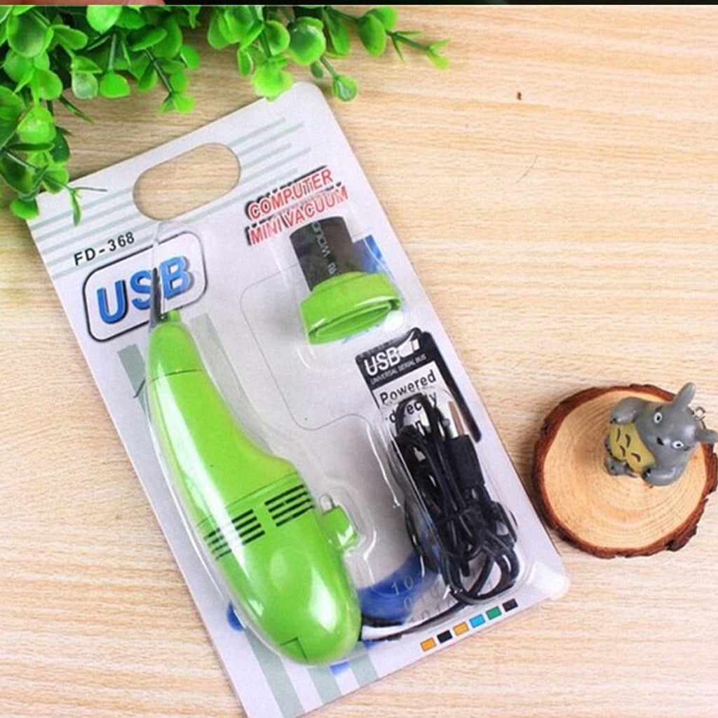 Effective USB mini vacuum cleaner for removing dust and debris from car interiors and keyboards.