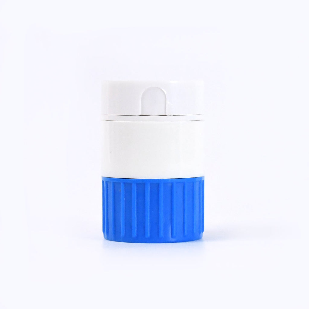 Portable medicine cutter and crusher device, ideal for travel and daily use.