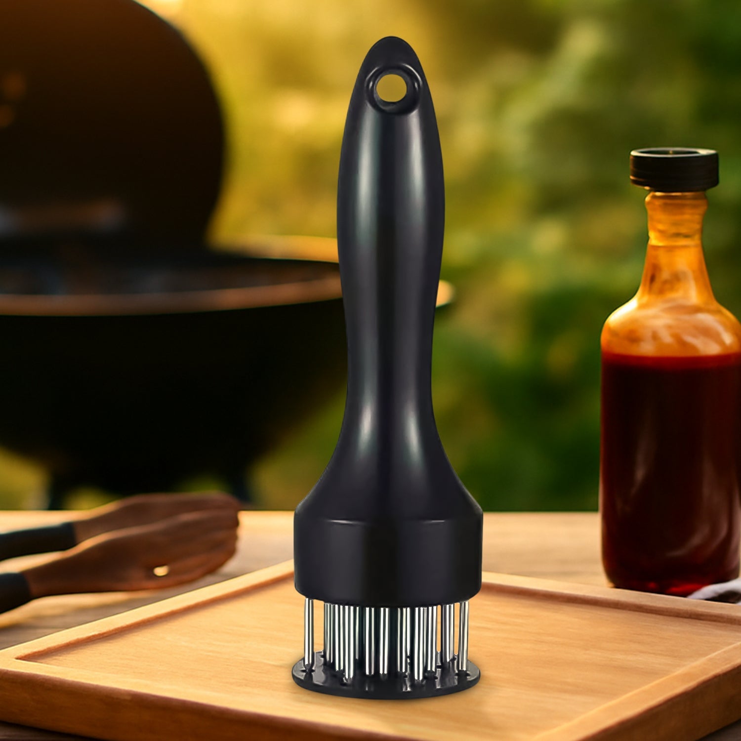Top-down view of the meat tenderizer tool, highlighting its durable construction.