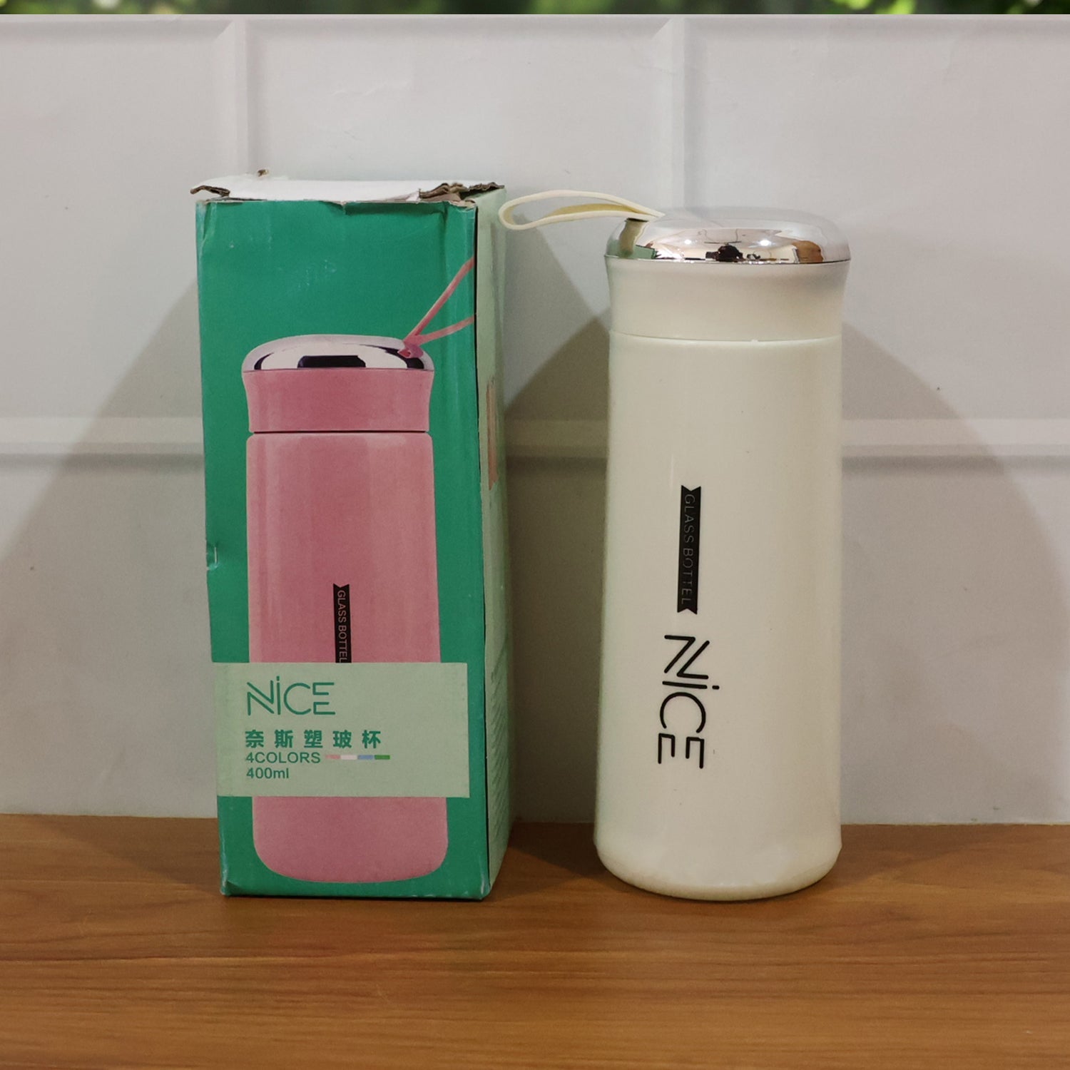 Compact and lightweight 400 ML white glass water bottle for daily use