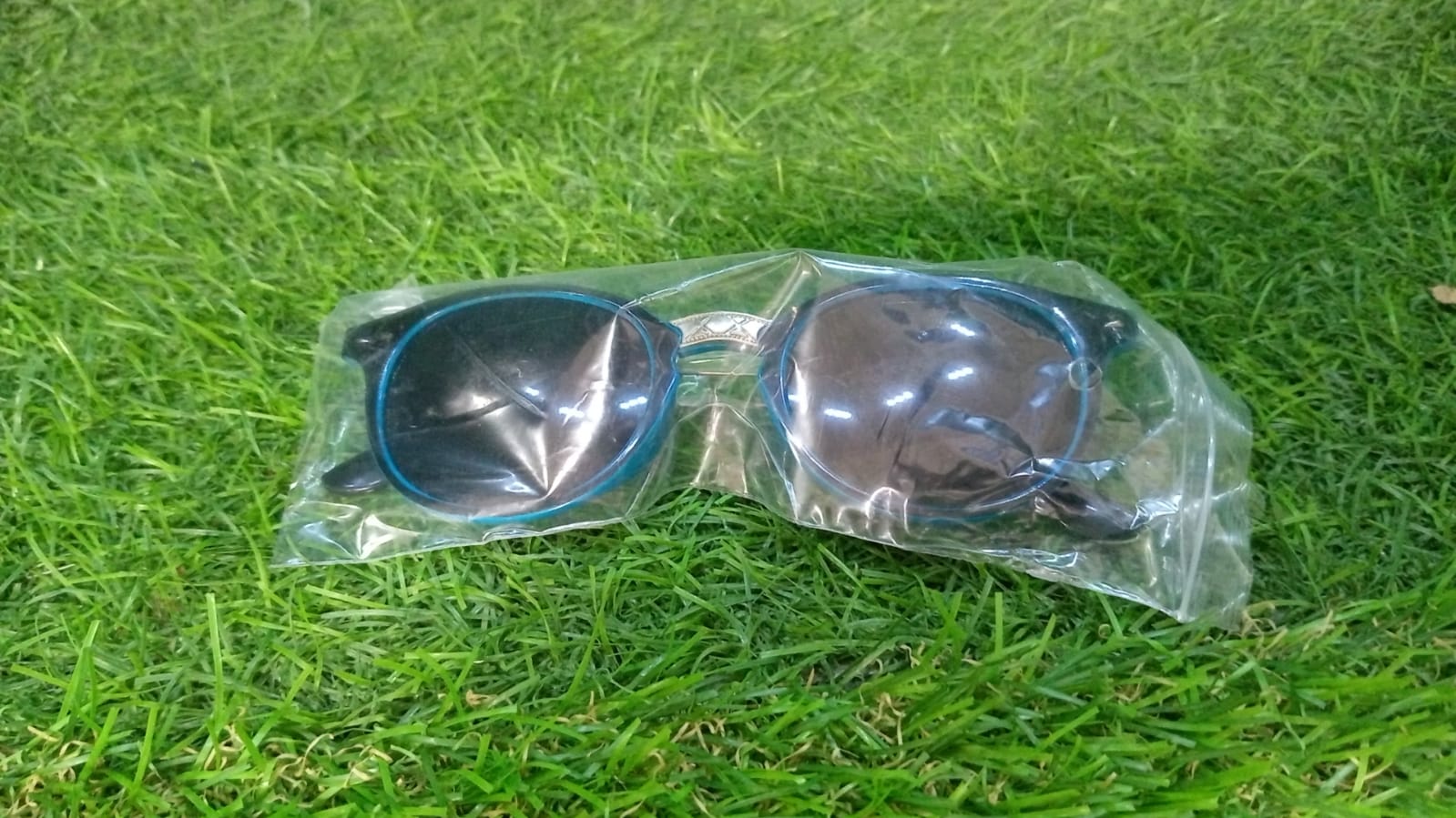 Front view of lightweight UV Protected Round Sunglasses, offering 100% protection for daily use.