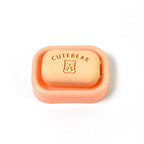 Assorted soap-shaped erasers packaged in a compact case