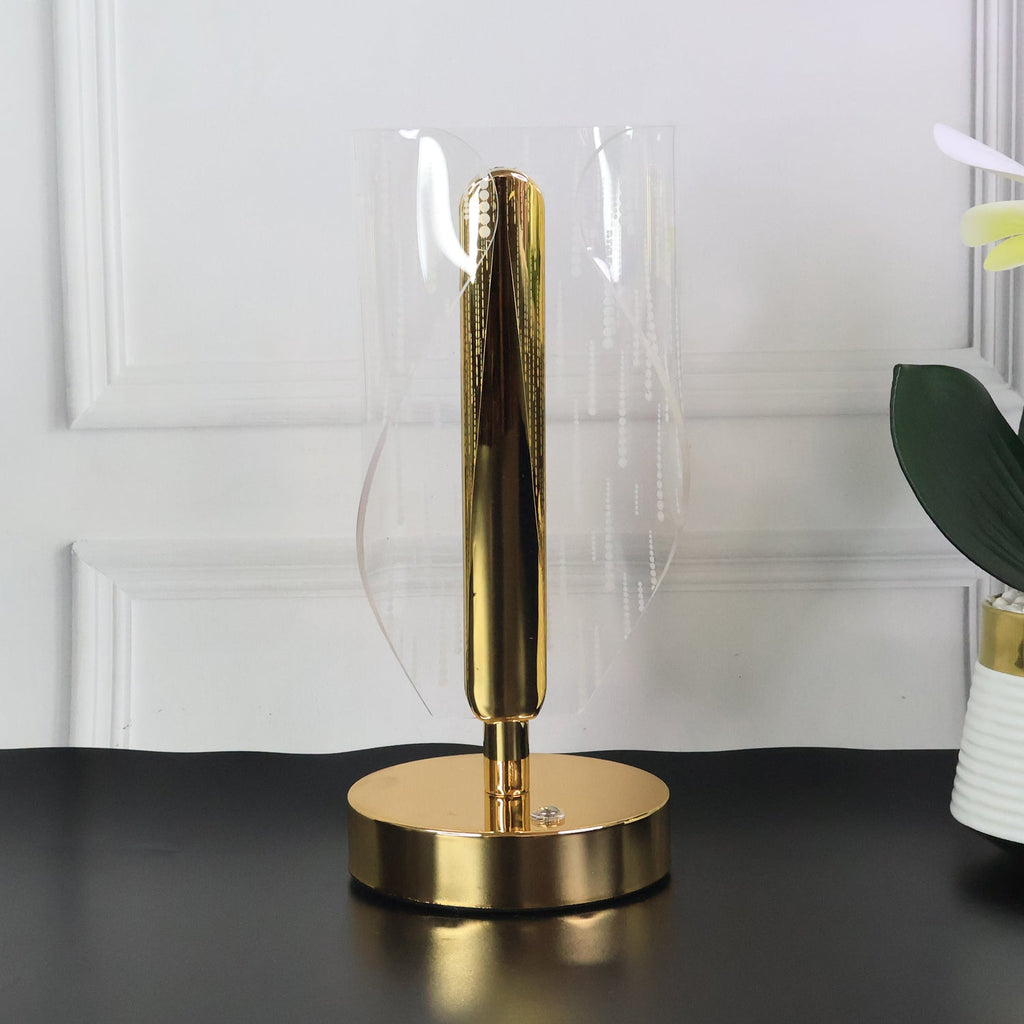 Decorative crystal LED table lamp placed on living room shelf