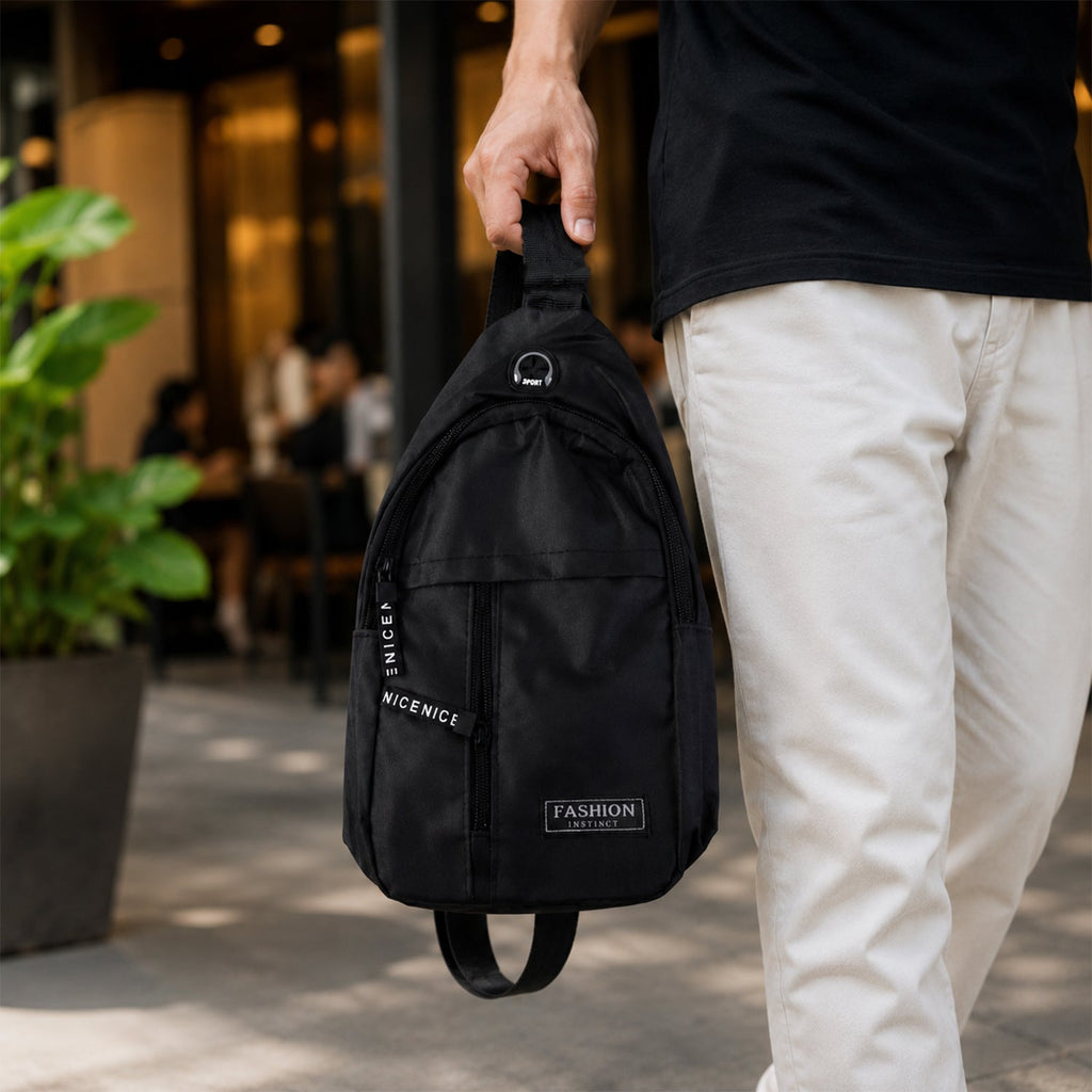 A person comfortably wearing the FERVENT crossbody sling bag across their chest during travel.