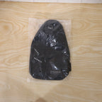 The versatile waterproof sling bag neatly organized with travel essentials like phone and wallet.