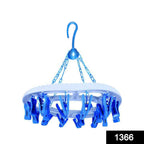 Top-down view of the multicolour 18-clip round plastic cloth drying hanger.