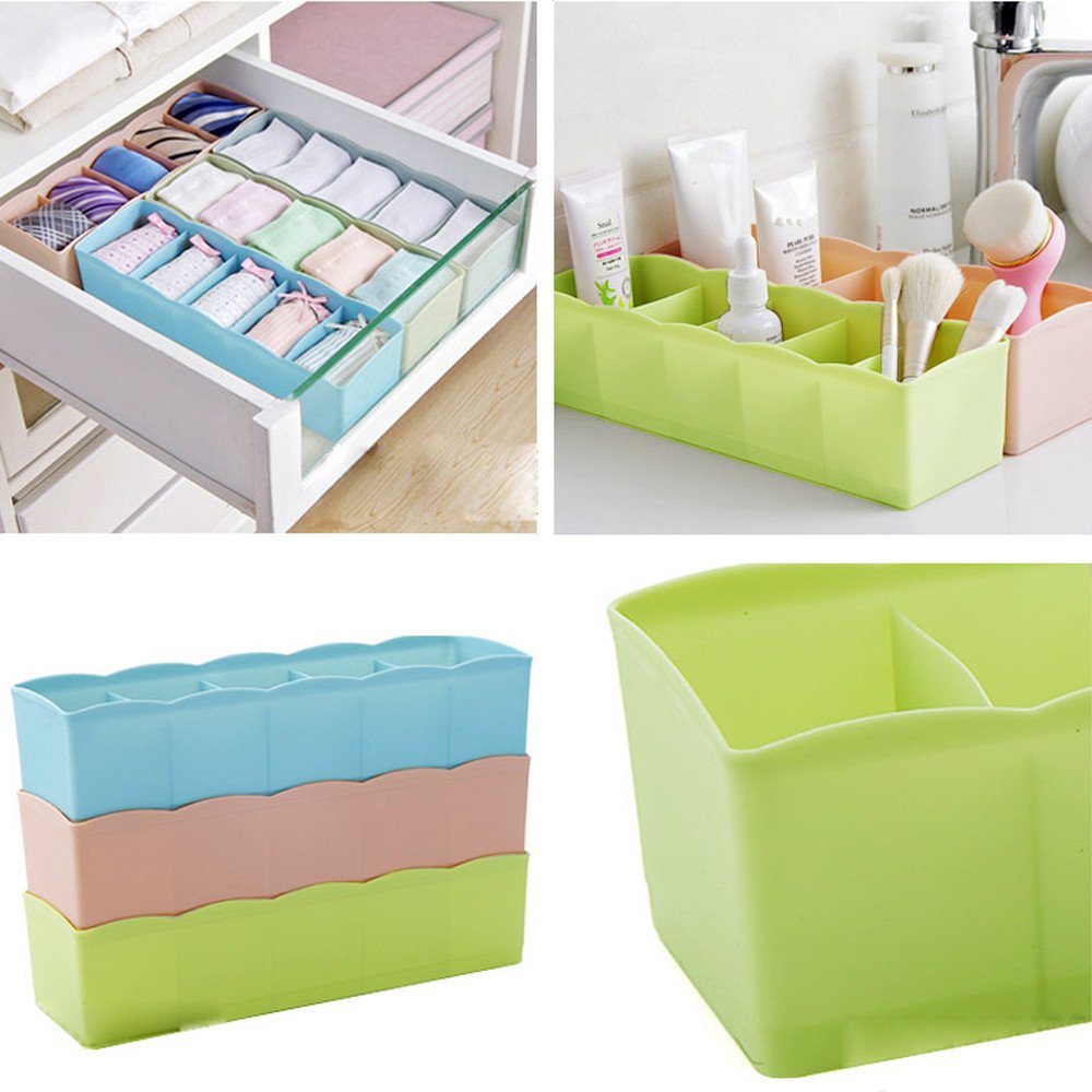 Clear plastic divider box displaying its robust construction and separate sections.