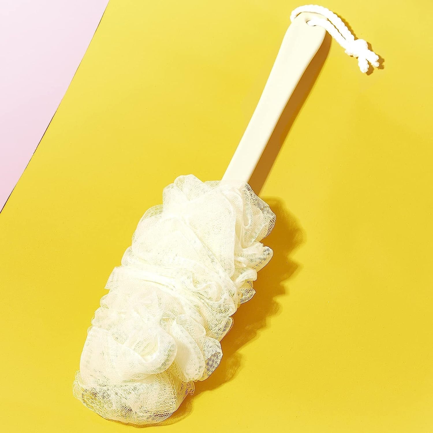 Soft nylon back scrubber in action, demonstrating its flexibility and reach.